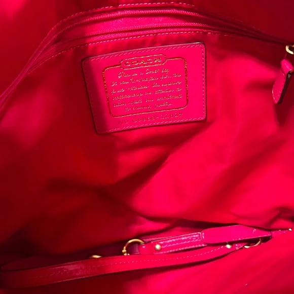 Pink and brown coach purse. I never used it after getting it. - Picture 2 of 2